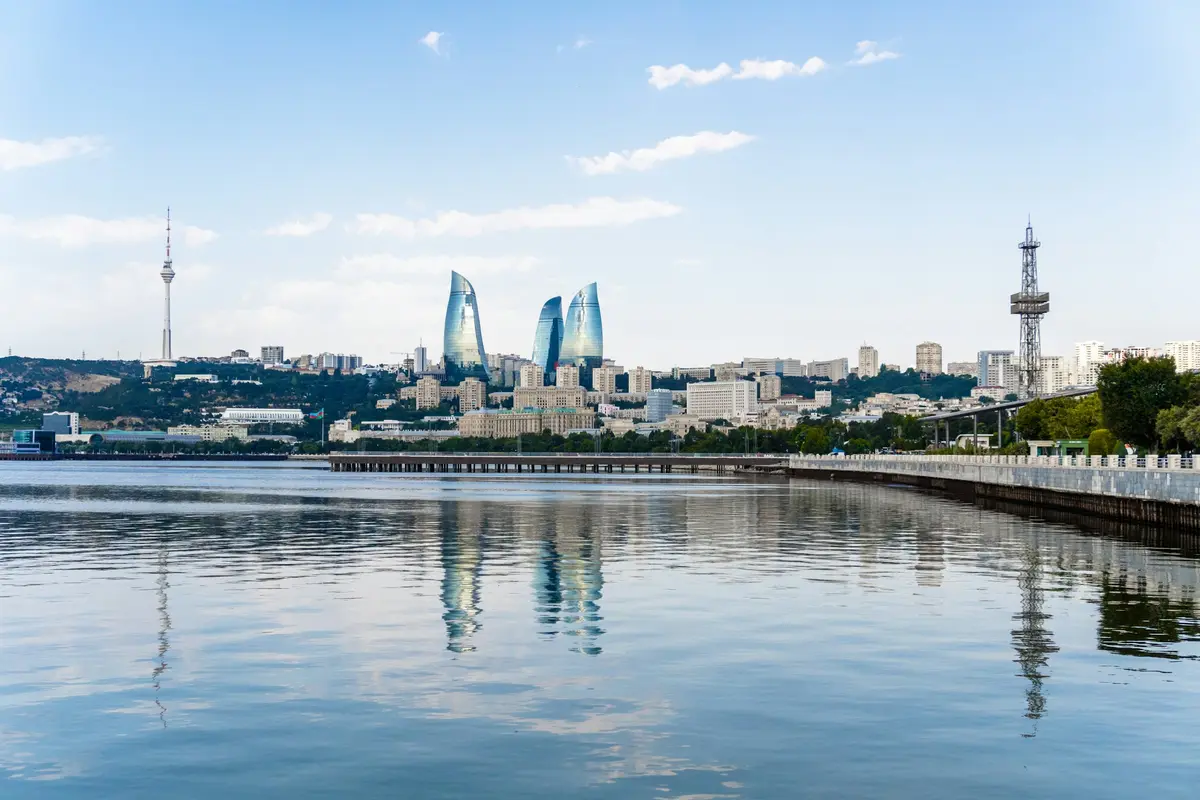 Baku skyline with the Flame Towers reflected in the Caspian Sea